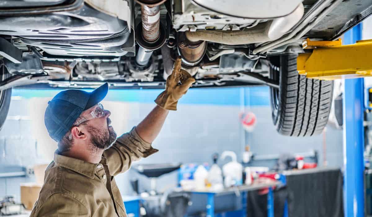 2025 Acura Mdx Vs 2025 Toyota Highlander Warranties 2 Professional Mechanic Performing Car Undercarriage Inspection